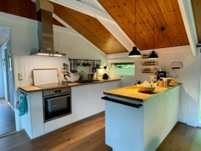 Ferienhaus Kleine Auszeit in der Natur mit Kamin, Yogamatten, schöne Küche
